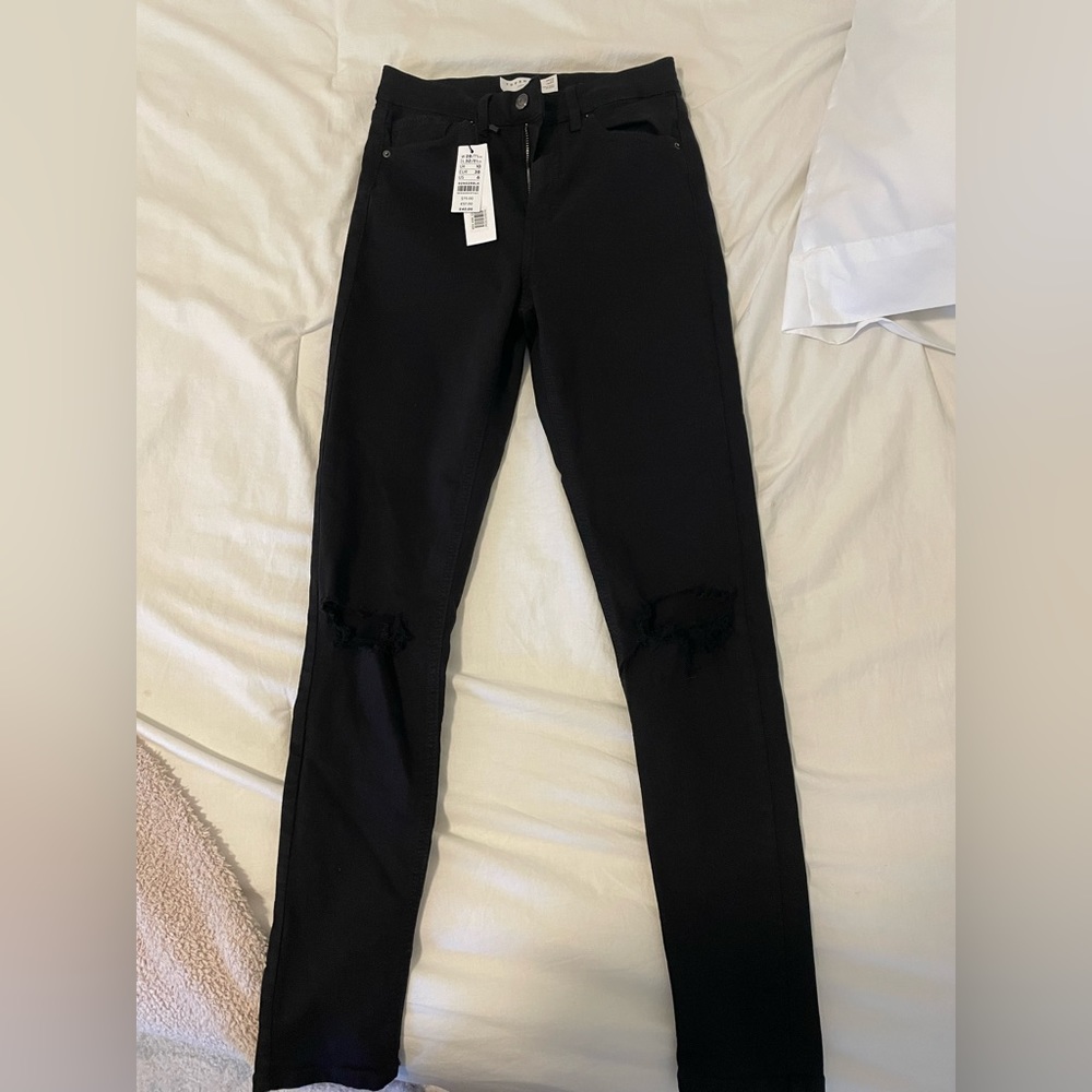 Black ripped jeans